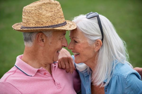 Elderly couple being affectionate