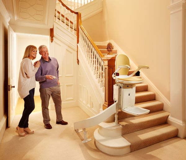 Couple looking at their stairlift