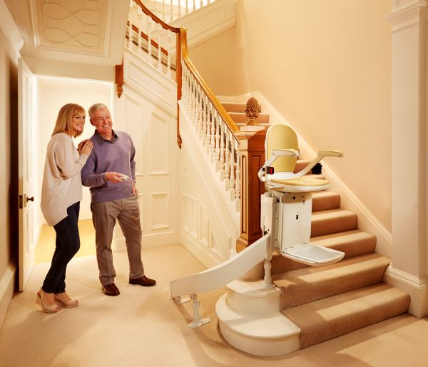 Couple looking at their stair lift